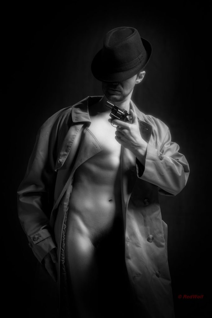 Image of a partially nude film noir style detective
